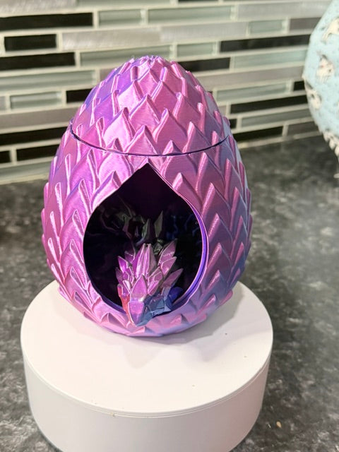 Dragon egg with rotating inner wall and a beautiful spike dragon inside