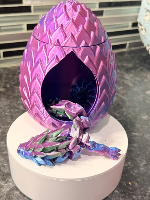 Dragon egg with rotating inner wall and a beautiful spike dragon inside