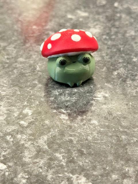 Frog with mushroom hat